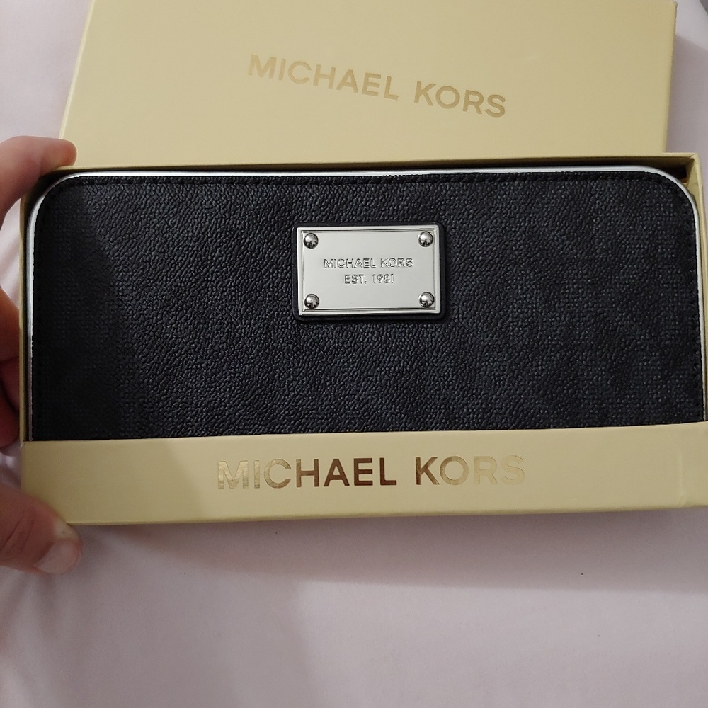 Michael Kors Black silver zip around wallet.